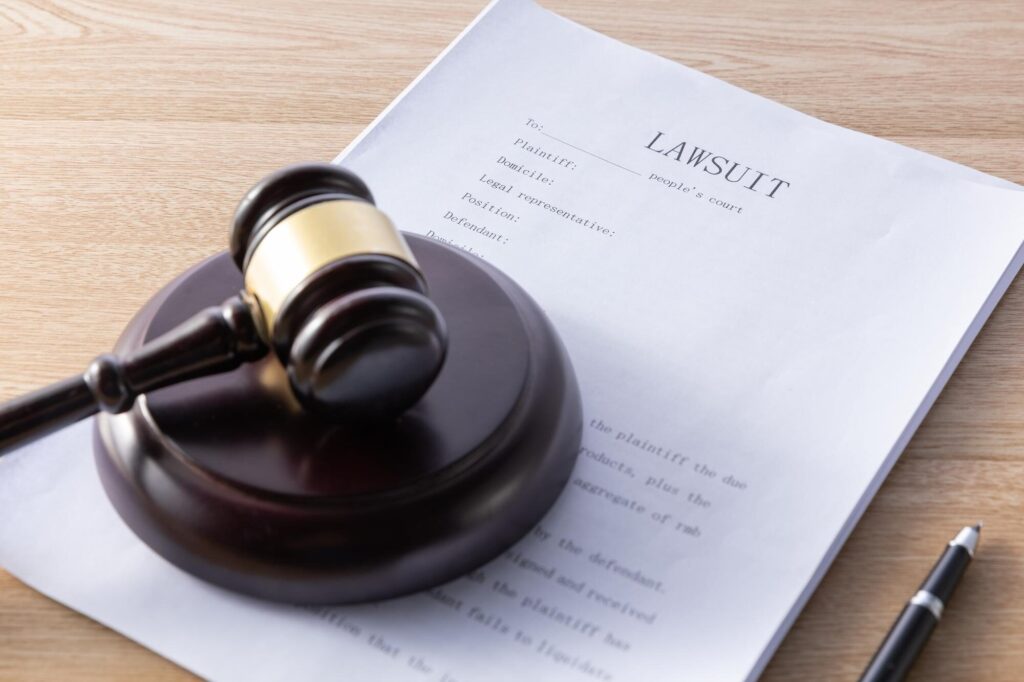 lawsuit file under commercial collection laws and compliance